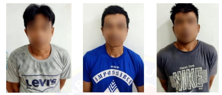 AJARAN SESAT... Tiga individu yang ditahan dalam serbuan di salah sebuah rumah pekerja Ladang Bukit Kertam, Kota Kinabatangan.