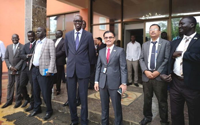 3. Eruwan with his Sudd Petroleum Operating Company (SPOC) leadership team during his assignment in South Sudan_1_edit_106964138575860